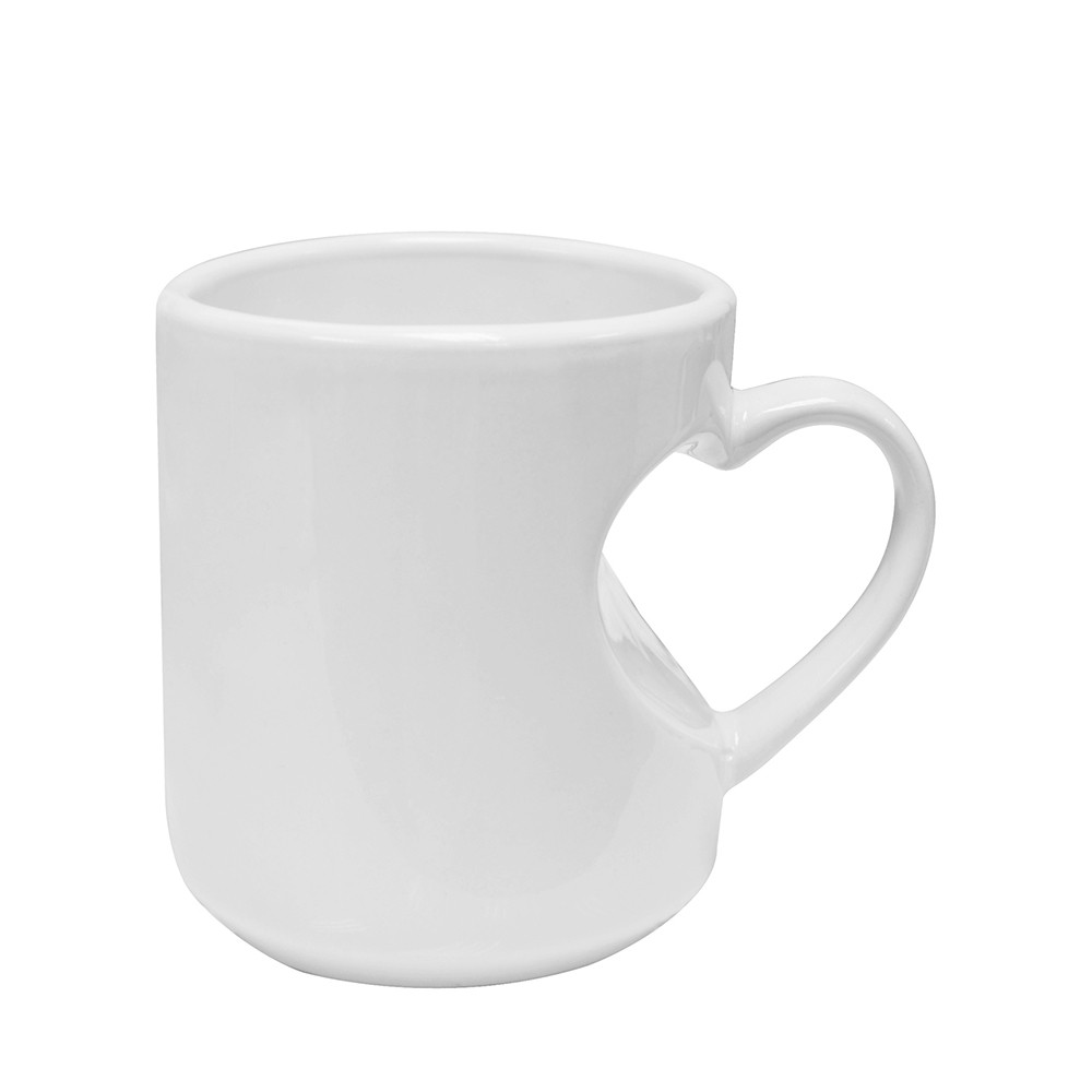 Tasse blanche à poignée en forme de coeur